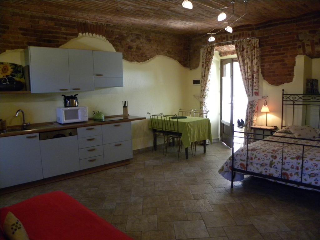 Agriturismo Fano'S Farm Suno Room photo