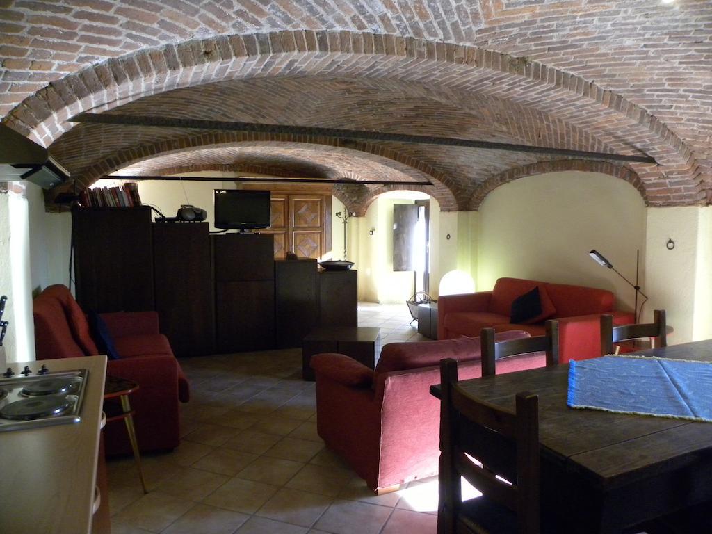 Agriturismo Fano'S Farm Suno Room photo