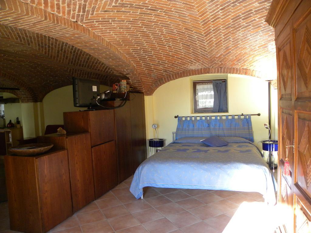 Agriturismo Fano'S Farm Suno Room photo