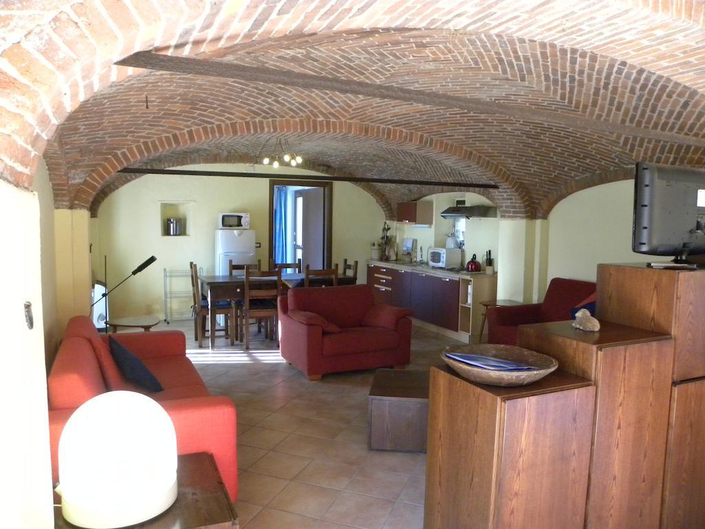 Agriturismo Fano'S Farm Suno Room photo