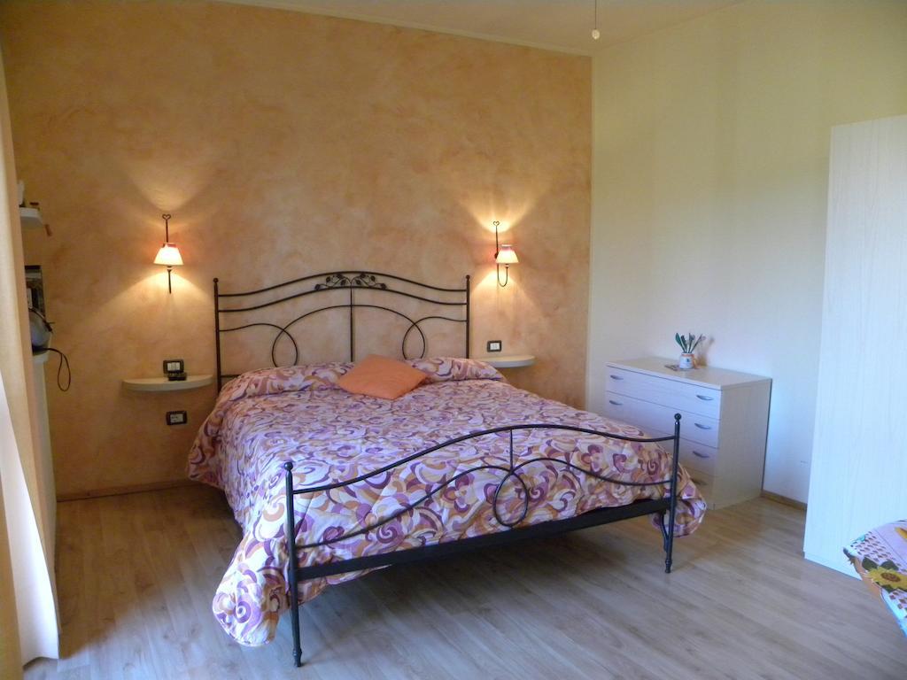 Agriturismo Fano'S Farm Suno Room photo